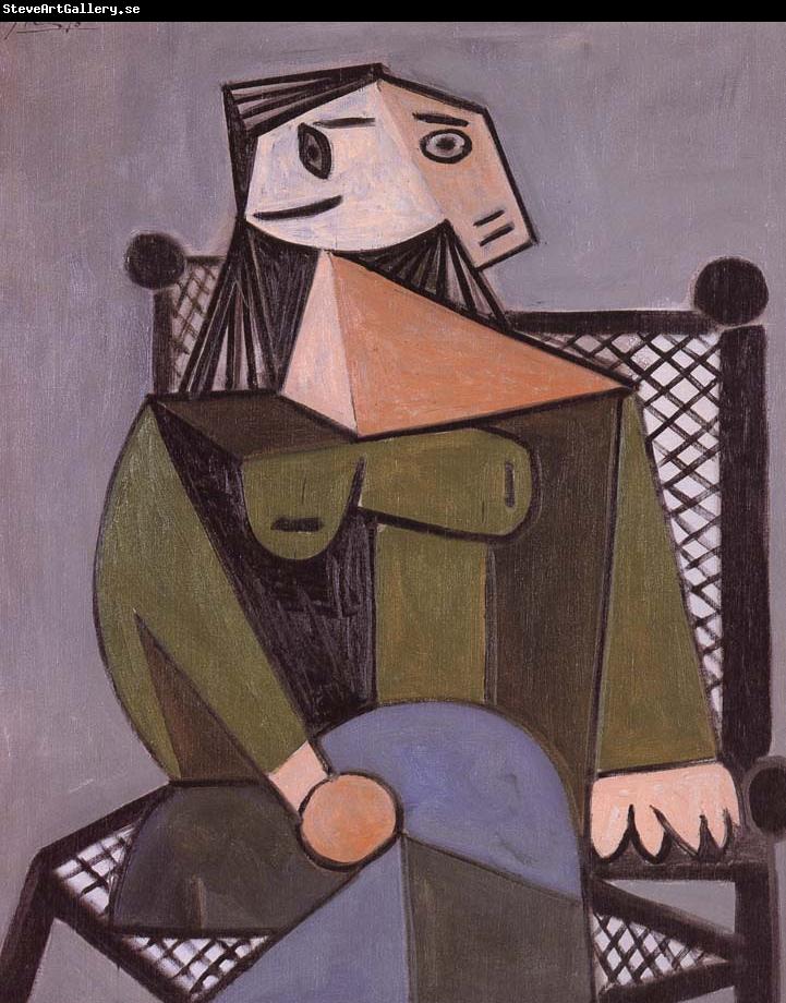 pablo picasso woman in an armcbair